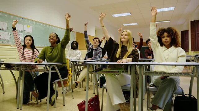 Diverse group of teenage students participating and answering questions during a lesson