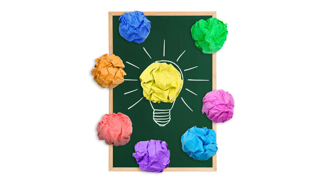 Creative Idea Concept with Light Bulb and Colorful Crumpled Paper

