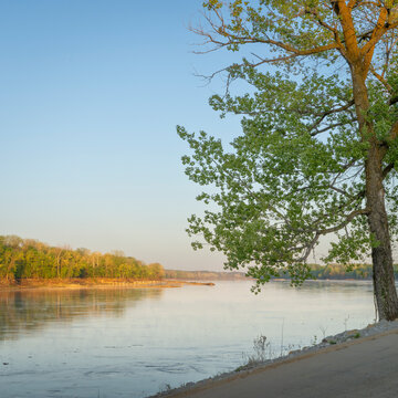 calm spring sunrise over Missouri River at Dalton Bottoms boat ramp