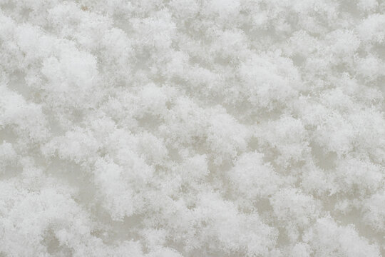 Close up of fluffy snowflakes as abstract winter texture