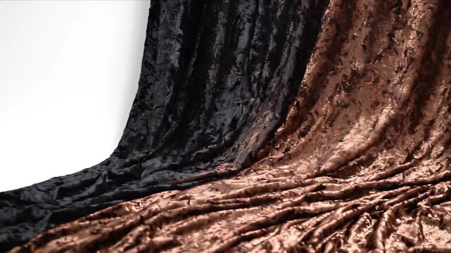 Abstract black and brown velvet fabric texture with flowing fold drapery, dark tree bark grooves, rich textile surface, dramatic luxury background for elegant design composition