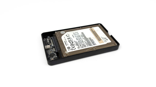 Kediri, East Java, Indonesia &ndash; August 21, 2026: Computer Hard Disk Drive with Metallic Cover and Label Displayed on White Background
