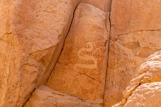A view of a serpent drawing etched in the walls of the Culebrillas canyon close to Arequipa, Peru in the dry season