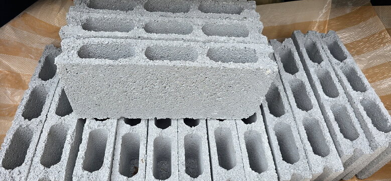 Concrete blocks, made from cement, sand,  have hollow core and are commonly used in wall construction. Cinder blocks have a hollow center that helps dissipate heat and are lighter than solid concrete.