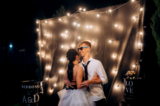 A dance of a young, unusual, freaky newlywed couple against
