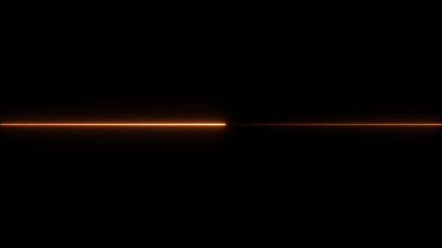 Bright green laser beam with glowing particles on dark background