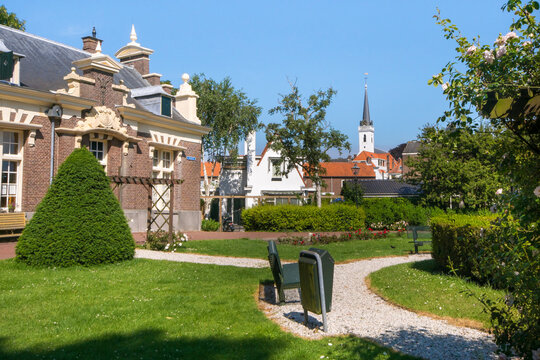 Park in the old town of Brielle, The Netherlands. Historic buildings.