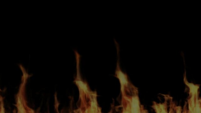 Digital orange flames burning upward on a green background with glowing embers rising with video animated fire burning green screen sparks flying upwards flickering with combustion