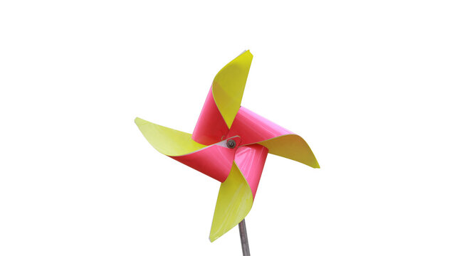 Colorful paper pinwheel toy isolated on a white background with pinwheel windmill colorful isolated childhood spinning rotation decoration recreation innocence nostalgia vertical cheerful