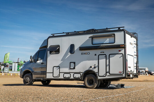 Loveland, CO, USA - August 21, 2026: Winnebago EKKO camper van, Class C coach, built on Ford AWD Transit Chassis at a busy campground.