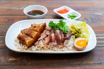 Fototapeta premium Stewed Pork leg rice with boiled egg in gravy.