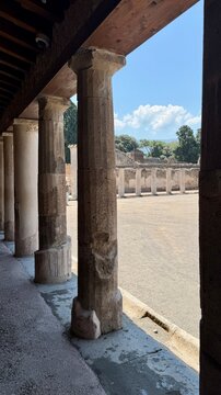 Ancient Roman Courtyard with Columns in a Pompeii House, Italy