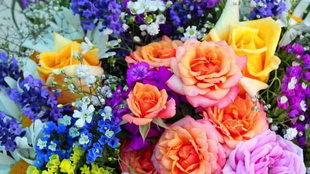 Colorful Rotating Bouquet Of Roses And Mixed Flowers Close-Up View