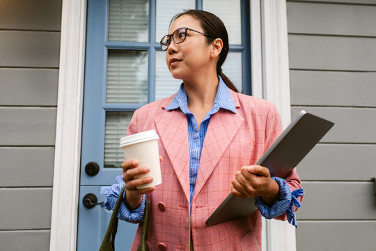 Realtor Arriving With Laptop