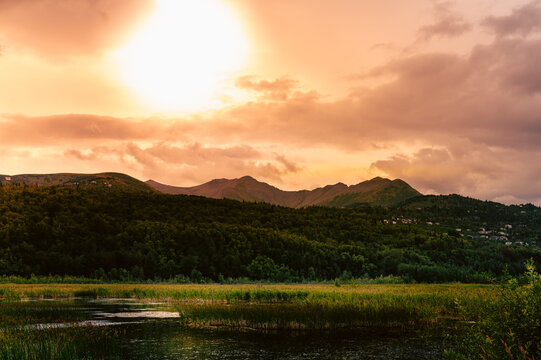 Anchorage Alaska summer mountain and marshland landscape at sunrise at Potter Marsh Wildlife Reserve Area