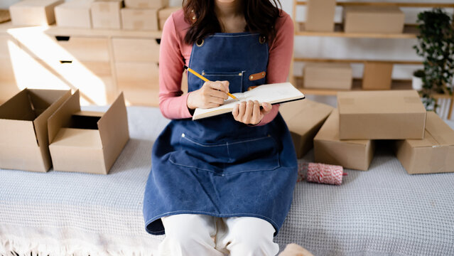 Small business owner packing in the cardbox&nbsp;preparing parcel for delivery online selling&nbsp;sell Online on the Internet from home