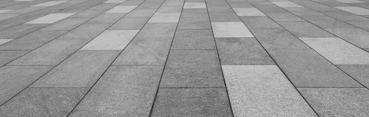 Fototapeta premium empty stone floor top in perspective. grey tile floor background in perspective view. line. empty copy space stone street. pavement. Granite outdoor tiled floor. gray granite. Marble texture