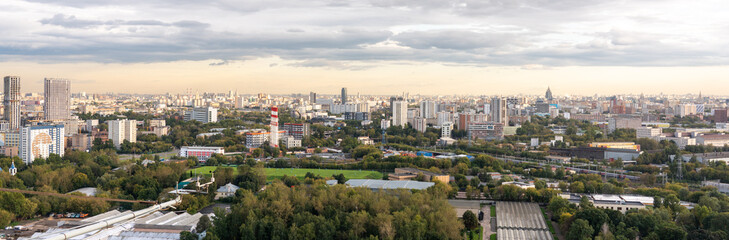 Naklejka premium Moscow aerial panorama with city district view. Panorama of the Russian city during sunset. Russian architecture