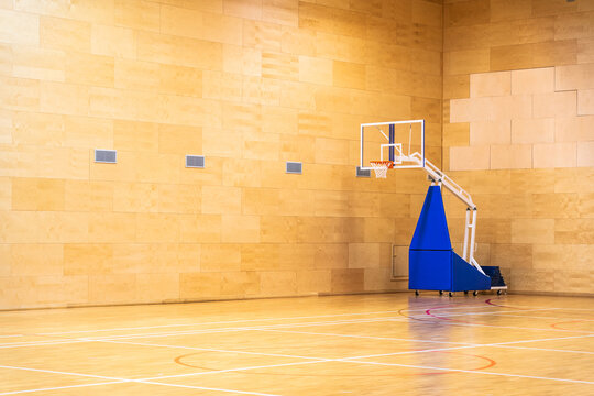 Basketball court with mobile moving basket with copy space