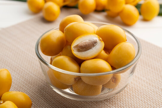 Fresh dates in glass bowl.raw fruits harvested straight from the palm tree without undergoing a formal dehydration process.