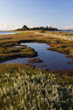 Picturesque coastal view of the causeway to the Langor  fishing village at the Stavns Fjord, Samsoe, Denmark
