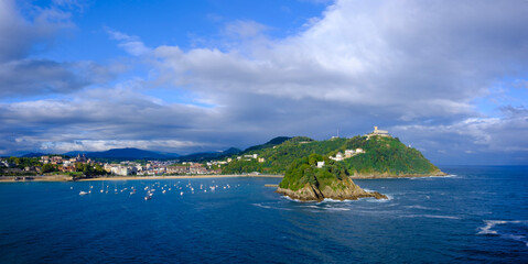 Fototapeta premium Santa Clara Island and Mount Igueldo in La Concha Bay, San Sebastian, Basque Country, Spain