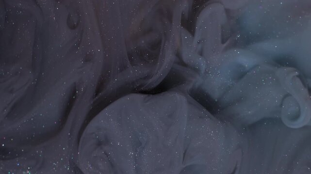 Sparkling ink. Abstract fog. Blur purple blue color glitter cloud splash acrylic fume texture spreading on creative bokeh background.