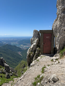 a suggestive public bathroom overlooking the mountain slope
