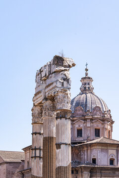 The church of Santi Luca e Martina and Three columns of the Temple of Castor and Pollux in the Roman Forum, Rome, Lazio, Italy