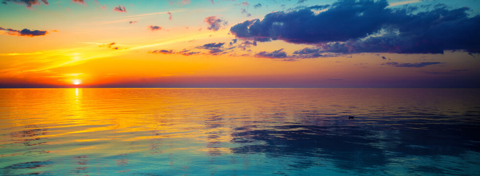 Seascape in the early morning. Sunrise over the sea. Nature landscape