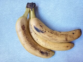 A bunch of very ripe yellow bananas with damaged skin © Vita 9224