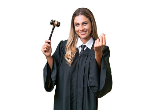 Judge Uruguayan woman over isolated background making money gesture