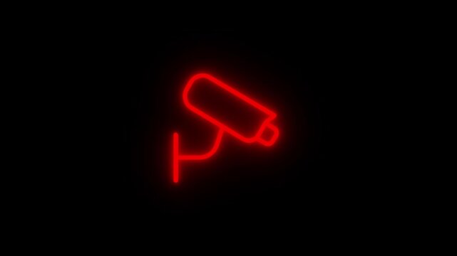 Bright red neon security camera icon glowing on black background a surveillance