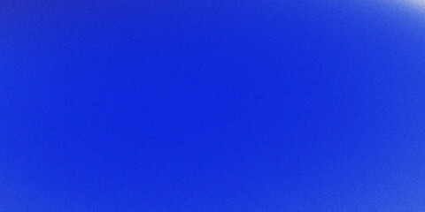 Naklejka premium Vibrant solid blue textured background featuring subtle grain for professional design.