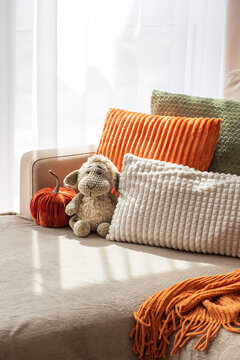 Cozy Autumnal Decor Arrangement Sofa Comfort Home Interior With Stuffed Toy Pumpkin Pillows And Blanket