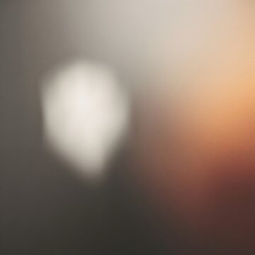 Abstract blurred background with soft white shape and warm earth tone gradient white spot abstract blur abstract