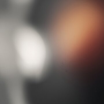 Abstract dark blurred background with warm copper and white soft lighting gradient dark backdrop copper tone