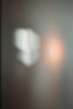 Abstract blurry background with soft white and warm light spots bokeh effect white blur defocused light abstract