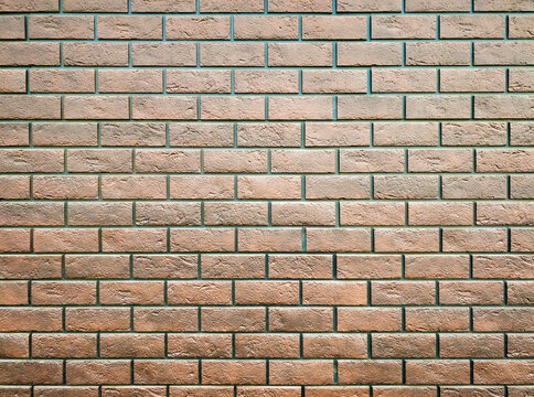 Stylish brutal modern brown brick wall texture. Background close-up for advertising.