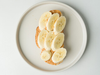 Banana Slices On Bread With Creamy Brown Spread © nut