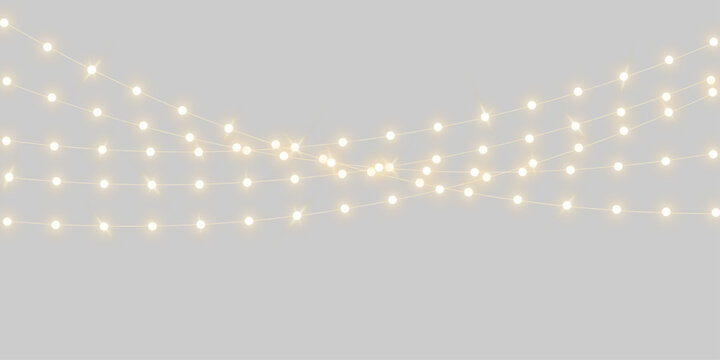 Warm glowing led lighting, string lights garland , Christmas fairy light overlay with shiny glittering white bulbs illumination for festive event celebration outdoor party decoration on transparent 
