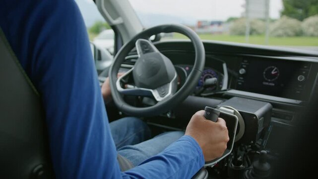 Driver with disability operating an adapted van designed for accessible driving, independent mobility, and transportation.