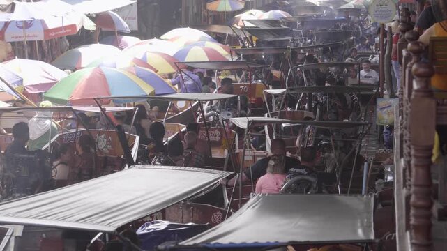 Damnoen Saduak Floating Market in Thailand, during a very busy day.