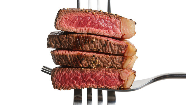 Stack of four medium-rare grilled steak slices seasoned with pepper impaled on a fork, isolated on transparent background