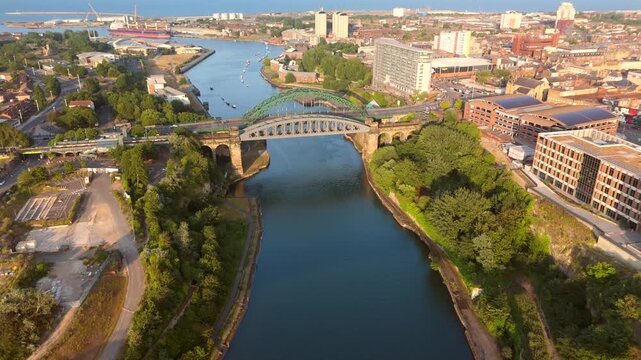 Sunderland UK: 17th July 2026: Drone footage of Sunderland River Wear and city centre at golden hour. Keel Crossing footbridge, Wearmouth Bridge and the Monkwearmouth Railway Brid