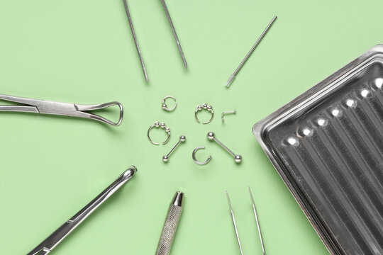 Body piercing tools and jewelry, professional piercing studio equipment, sterile instruments for safe body modification