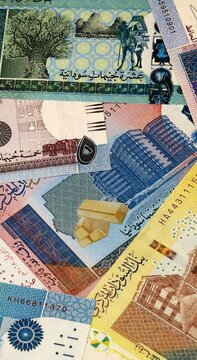 Sudanese pound money bills in pile on table. Sudan SDG currency cash close up