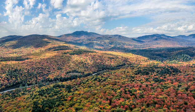 Panoramic autumn landscape with mountains and blue sky - Kancamagus Highway