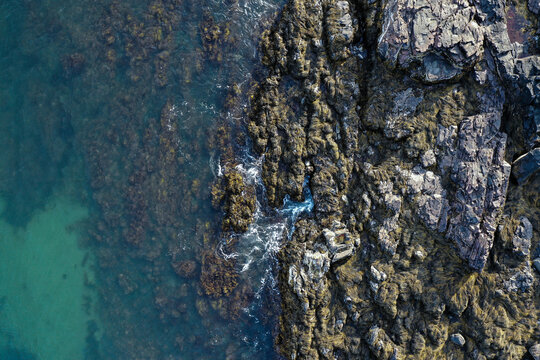waves crashing on rocks