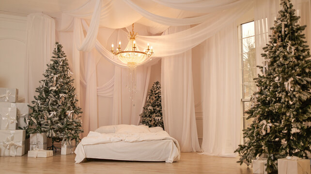 Elegant Christmas bedroom with festive trees and gifts, creating a cozy holiday atmosphere